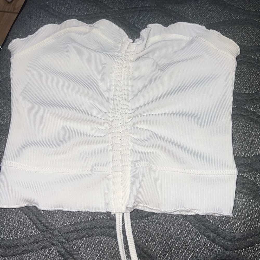 white crop top with tightened string